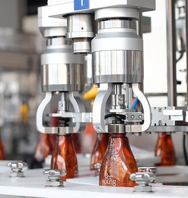 Huituo otomatik döner PET ve kapak çözücülü cam kapatma makinesi